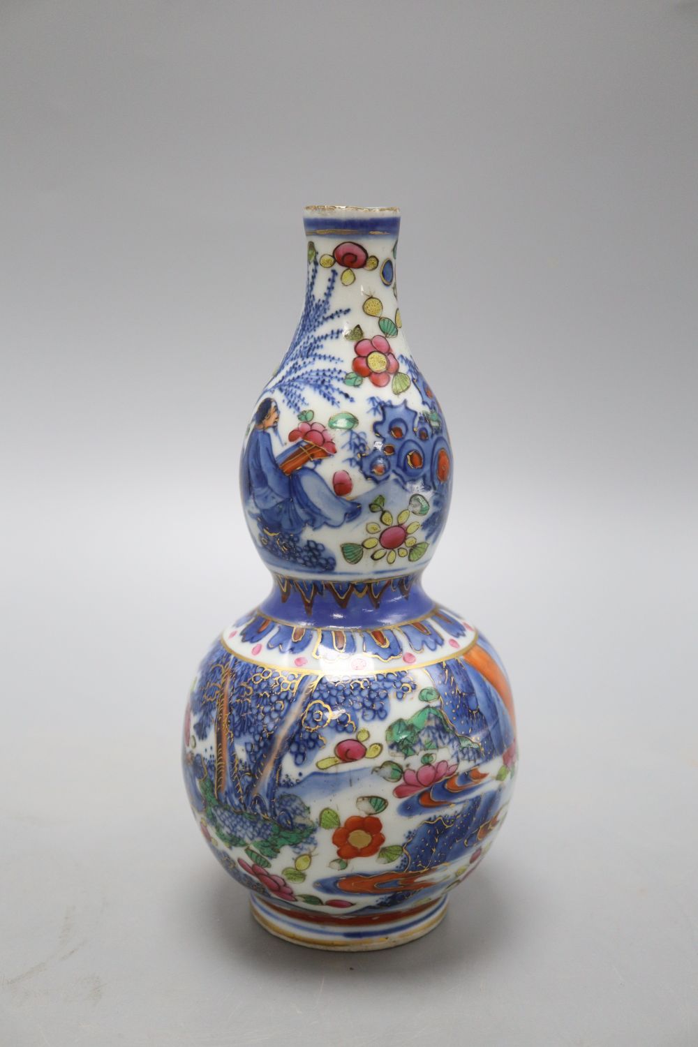 An 18th century Chinese clobbered double gourd vase, 19.5cm high